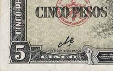 A Cuban five peso bill with the Che’s signature 